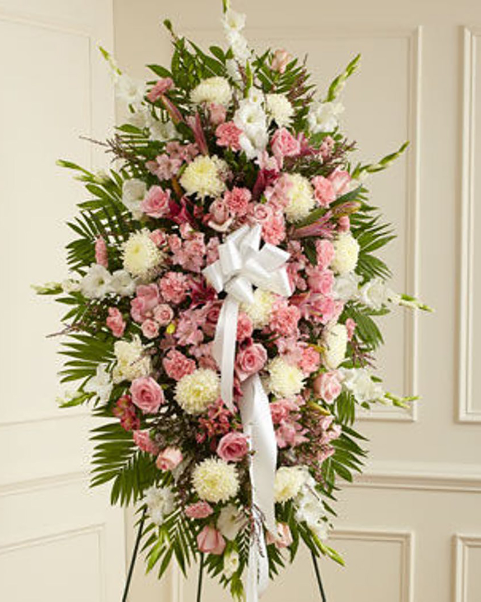 The Duchess Standard Standing spray with mixed flowers, designed with a pink and white color theme.
DELIVERY: Every order is hand-delivered direct to the recipient. These items will be delivered by us locally, or a qualified retail local florist.