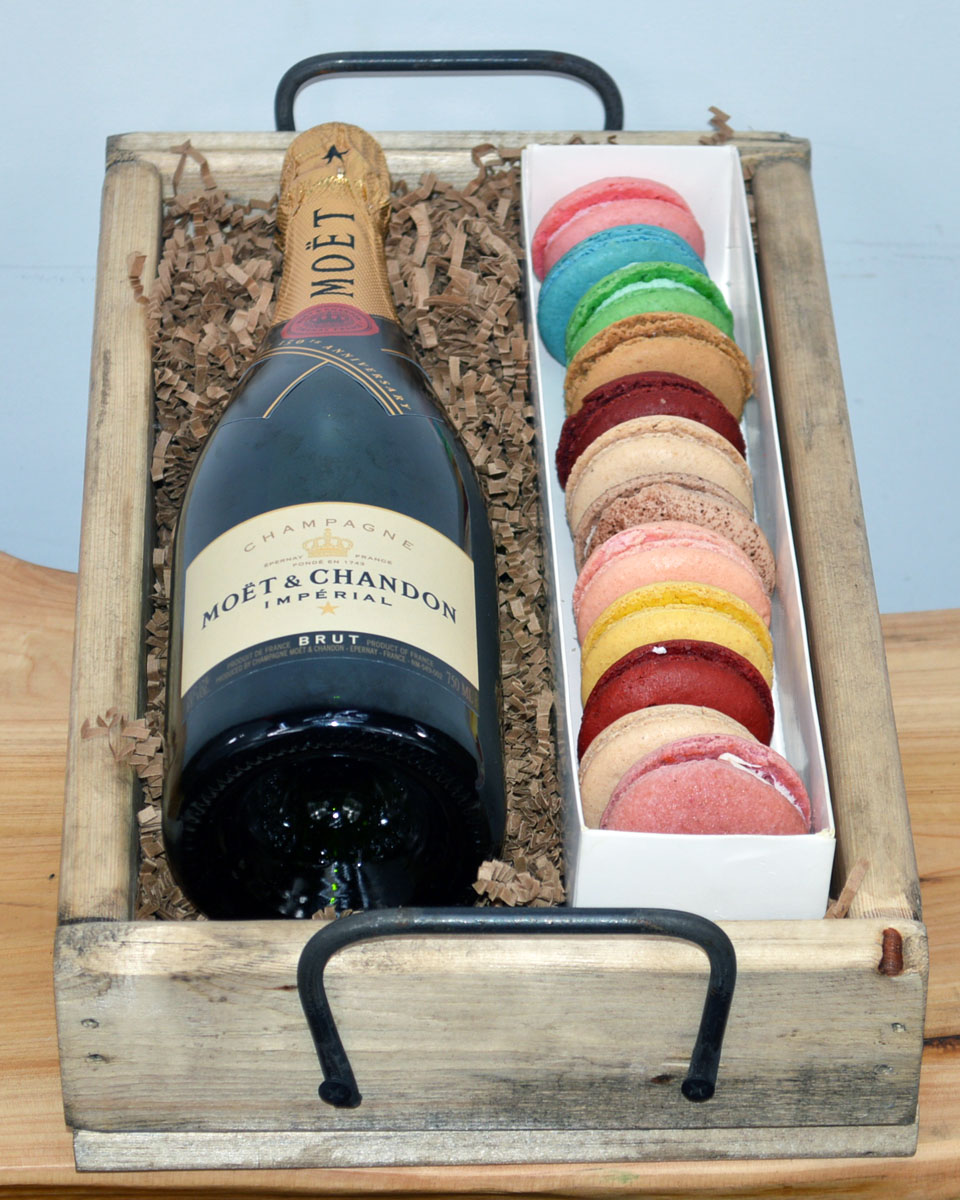 Wine and French Macaroons Moet & Chandon Champagne   Sumptuous French Macaroons and a Wine or Champagne of your choice are paired and crafted in a rustic wood crate. The Macaroons are baked fresh daily by Babbette Bakery, one of Long Beach's finest and oldest bakeries
DELIVERY: Every order is hand-delivered direct to the recipient. This item is only deliverable to local areas serviced by the Allen’s Flower Market chain and its affiliates.
