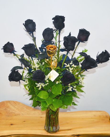 Black and Gold magic-From the design staff of Allen's Flower Market comes a truly unique item. Our Black Magic Roses are paired with a 24 Karrat Gold Dipped Rose and arranged in a vase. -Roses