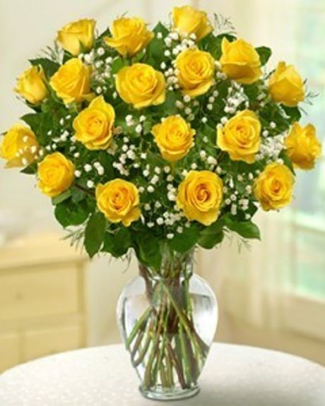 Yellow Roses-Beautiful Yellow Ecuadorian roses vased with assorted greenery and baby's breath.-Yellow rose arrangement