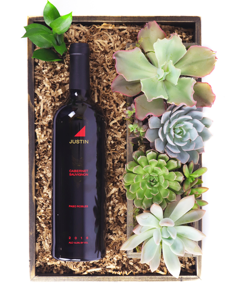 Wine and Succulents Justin Cabernet Sauvignon and Succulents The elegant combination of wine and a removable succulent planter makes a classic gift.
DELIVERY: Every order is hand-delivered direct to the recipient. This item is only deliverable to local areas serviced by the Allen’s Flower Market chain and its affiliates.
