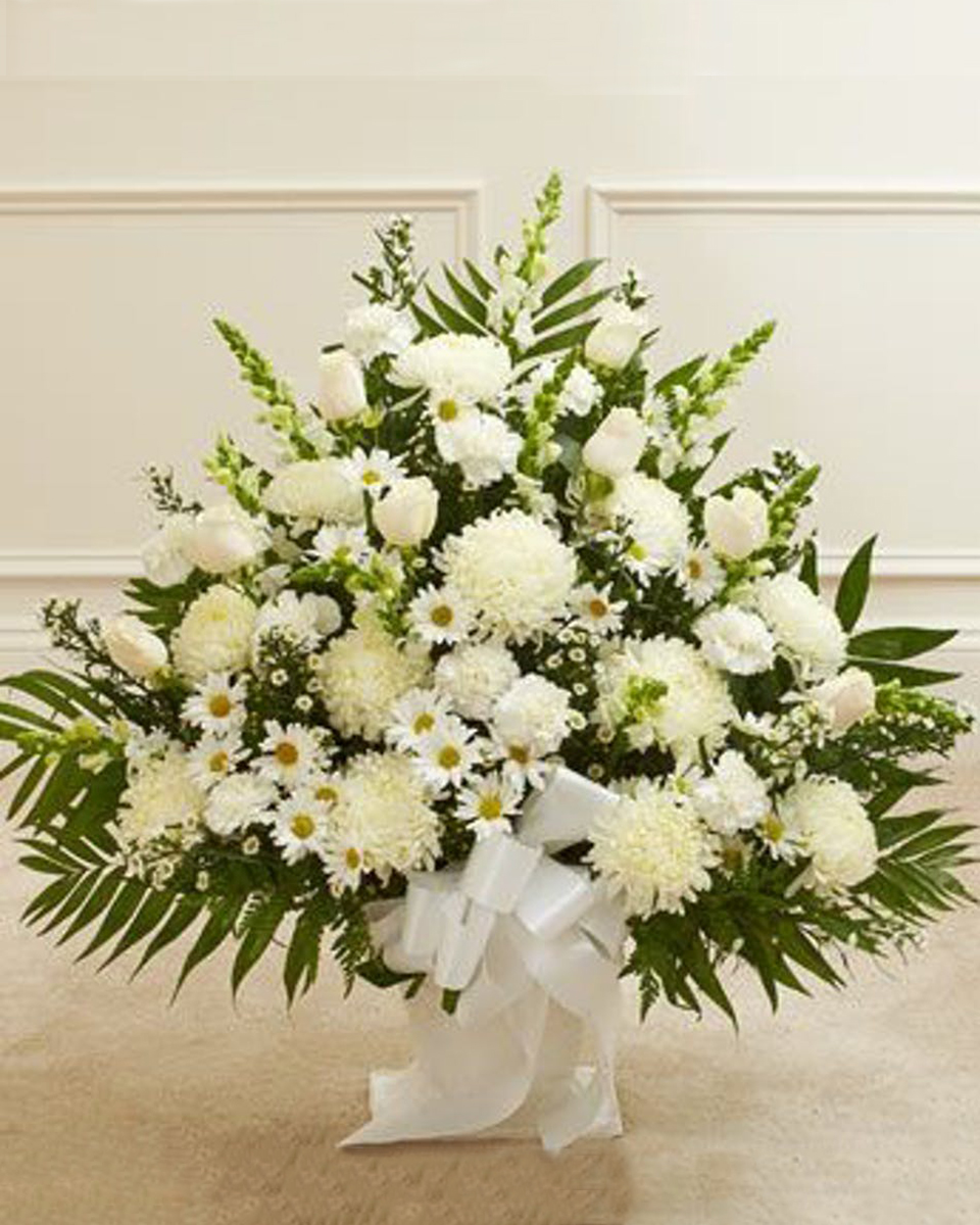 Garden Sympathy Basket in White Standard Garden sympathy basket filled with white flowers fresh from the garden. This is a beautiful way to express your sympathy.Premium arrangement measures approximately 32