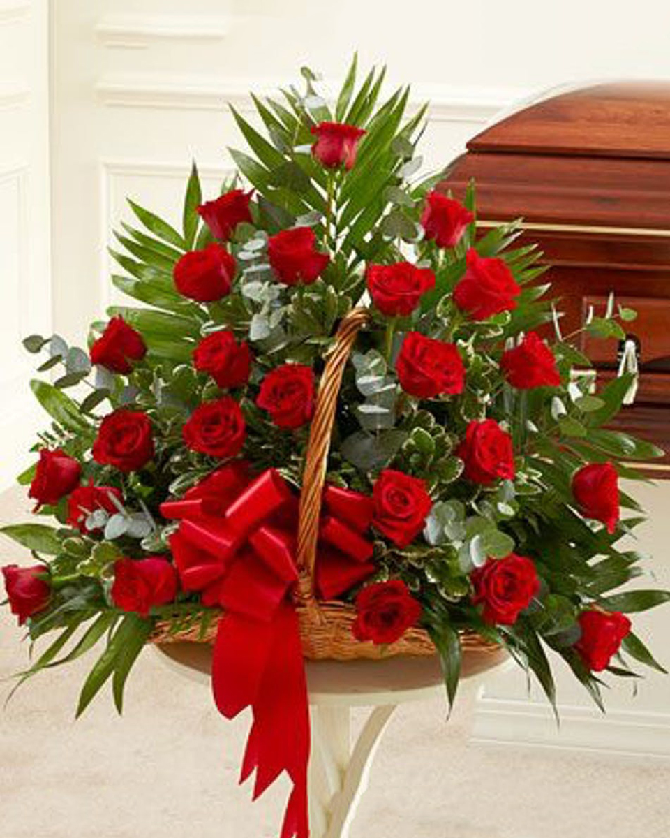 Red Rose Fireside Basket Standard (24 Roses) A very popular sympathy arrangment, this basket features 24 gorgeous red roses, eucalyptus & greenery. Measures approximately 28” H x 30” W.
DELIVERY: Every order is hand-delivered direct to the recipient. These items will be delivered by us locally, or a qualified retail local florist.