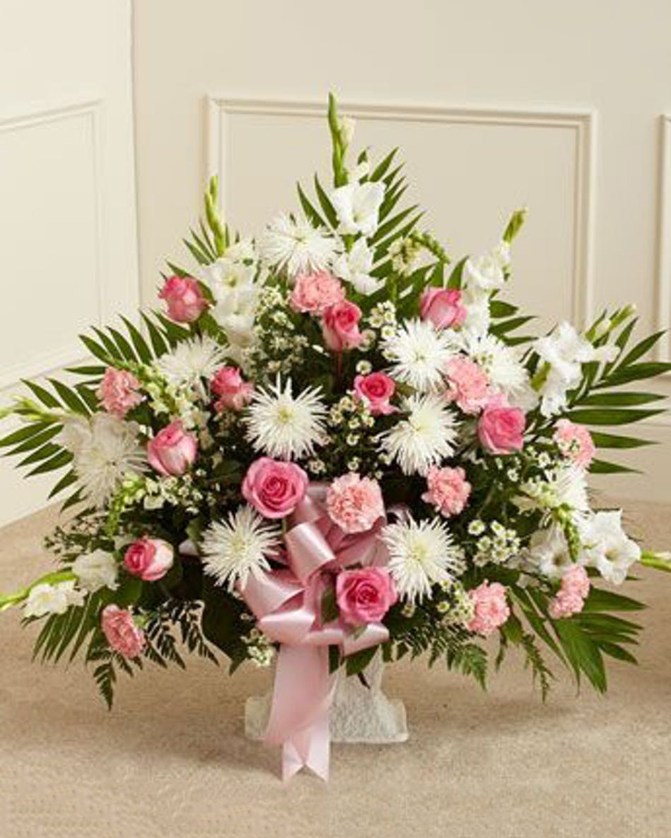 Soft and Elegant Sympathy Basket Deluxe The ever popular sympathy basket is shown here in a lovely mix of pink and white flowers. Premium measures approximately 32