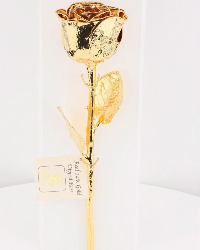 The Golden Rose This product contains a real rose that is totally covered, from bottom of the stem to the rose flower on top,  in 24 k gold. With the timeless beauty of nature, each rose is carefully selected, sized and preserved at the peak of its beauty. A fine delicate layer of lacquer has been applied to preserved its natural appearance, then electroformed and completed with 24k gold.
DELIVERY: Every order is hand-delivered direct to the recipient. These items will be delivered by us locally, or a qualified retail local florist.