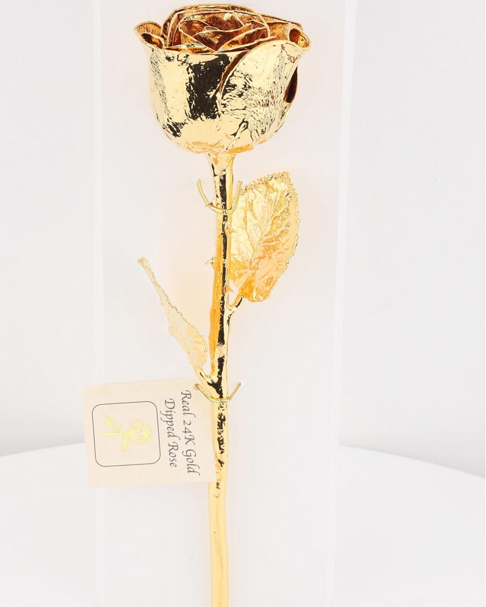 The Golden Rose Standard-12 inches Long This product contains a real rose that is totally covered, from bottom of the stem to the rose flower on top,  in 24 k gold. With the timeless beauty of nature, each rose is carefully selected, sized and preserved at the peak of its beauty. A fine delicate layer of lacquer has been applied to preserved its natural appearance, then electroformed and completed with 24k gold.
DELIVERY: Every order is hand-delivered direct to the recipient. These items will be delivered by us locally, or a qualified retail local florist.