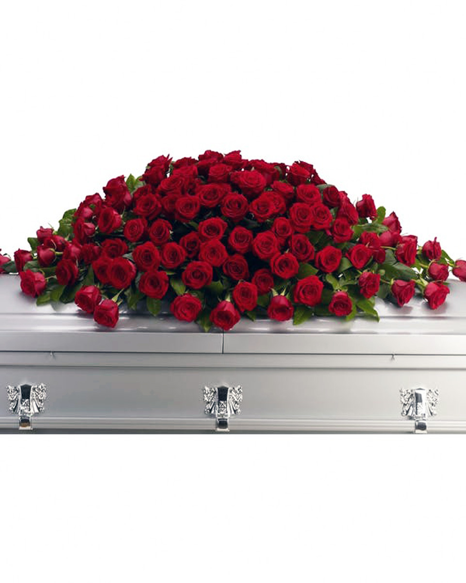 Only Red Roses Casket Spray Standard (84 Roses) Casket Spray in all Red Roses, assorted Greens
DELIVERY: Every order is hand-delivered direct to the recipient. These items will be delivered by us locally, or a qualified retail local florist.