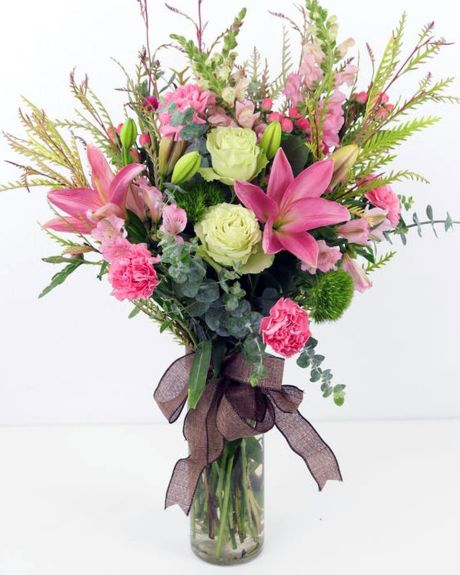 CALI BLUSH-This lush, colorful arrangement features loads of premium flowers and tons of texture.- VASE ARRANGEMENT