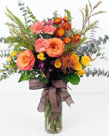 Cali Sunset-This lush, colorful arrangement features loads of premium flowers and tons of texture.-Vase Arrangement