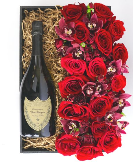 Champagne, roses, and orchids-Red Roses, Red Spray Roses, and Cymbidium orchids are paired with Dom Perignon Champagne-Champagne