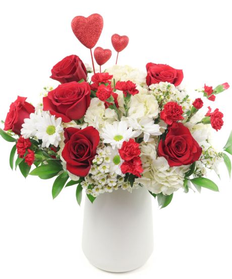 arts on fire-Red roses and carnations are exquisitely arranged with white hydrangeas and chrysanthemums in a keepsake white ceramic vase.-arrangement