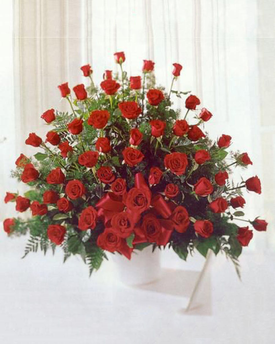 Red Rose Tribute Red Rose Tribute-Standard (60 Red Roses) 60 Roses (color of your choice) elegantly designed in a White Handled Sympathy Basket.
DELIVERY: Every order is hand-delivered direct to the recipient. These items will be delivered by us locally, or a qualified retail local florist.