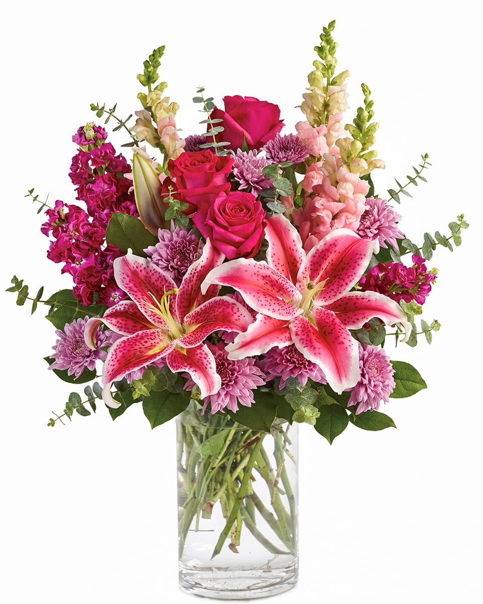 Scent of Spring Standard Scent of Spring - Bold and Beautiful, this stunning arrangement features pink roses, stargazer lilies, purple stock and more.
DELIVERY: Every order is hand-delivered direct to the recipient. These items will be delivered by us locally, or a qualified retail local florist.