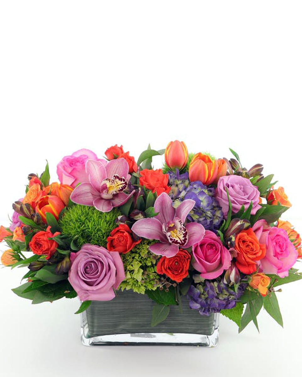Spring Love Standard Featuring a lush array of bright roses, hydrangea, tulips, orchids, dianthus and more, this versatile design is presented in a low glass container making it an ideal centerpiece or perfect to brighten any coffee table, counter, desk or space.
 
DELIVERY: Every order is hand-delivered direct to the recipient. This item is only deliverable to local areas serviced by Allen’s Flower Market Stores. 
