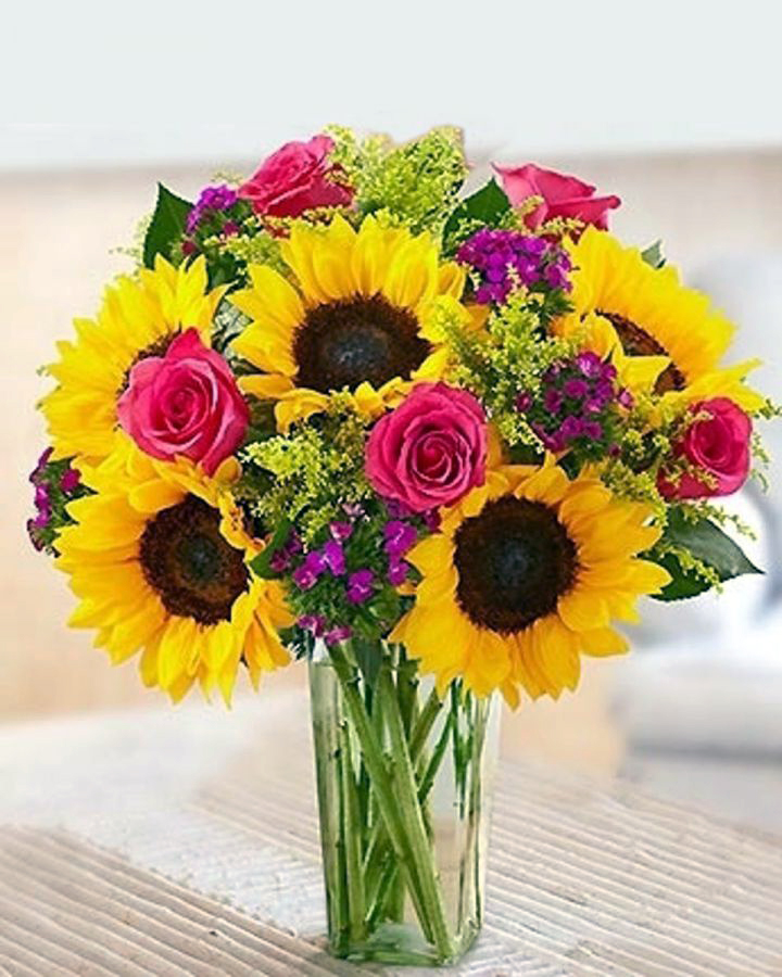 Sunflower Sensation Standard Romantic, whimsical, bold and bright: that's our Sunflower Sensation Bouquet. Bright yellow sunflowers, hot pink roses, Gypsy dianthus and solidaster come together for a gift that always makes a dramatic statement. Delivered fresh to the door for birthdays, anniversaries or 