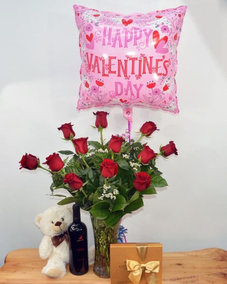 The Romantic- 1 dozen red roses, a teddy bear, wine, chocolates, and a mylar balloon.-rose arrangement