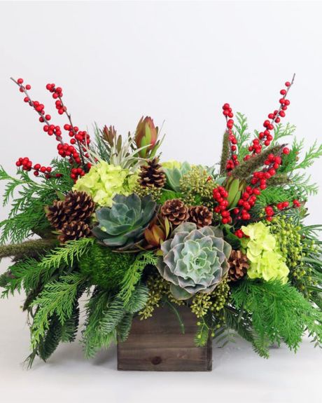 Winter Wonder-This stunning arrangement features all sorts of succulents, airplants, and other fun holiday accents and textures, presented in a contemporary wood box.-Christmas Arrangements